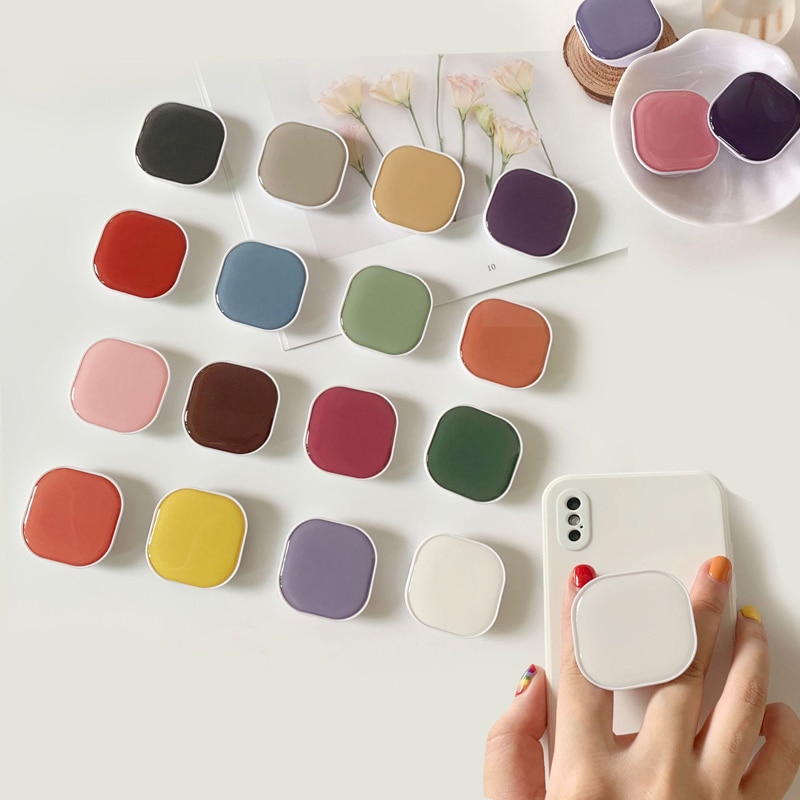 Support de téléphone portable de poignée d'airbag rétractable de colle de chute carrée pour des iphone samsung xiaomi support de support de couleur unie