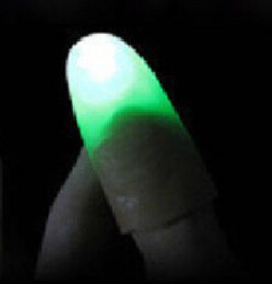 2 stk fest lysende legetøj magisk lys op glød tommelfingre fingre trick vises lys tæt på: Grøn