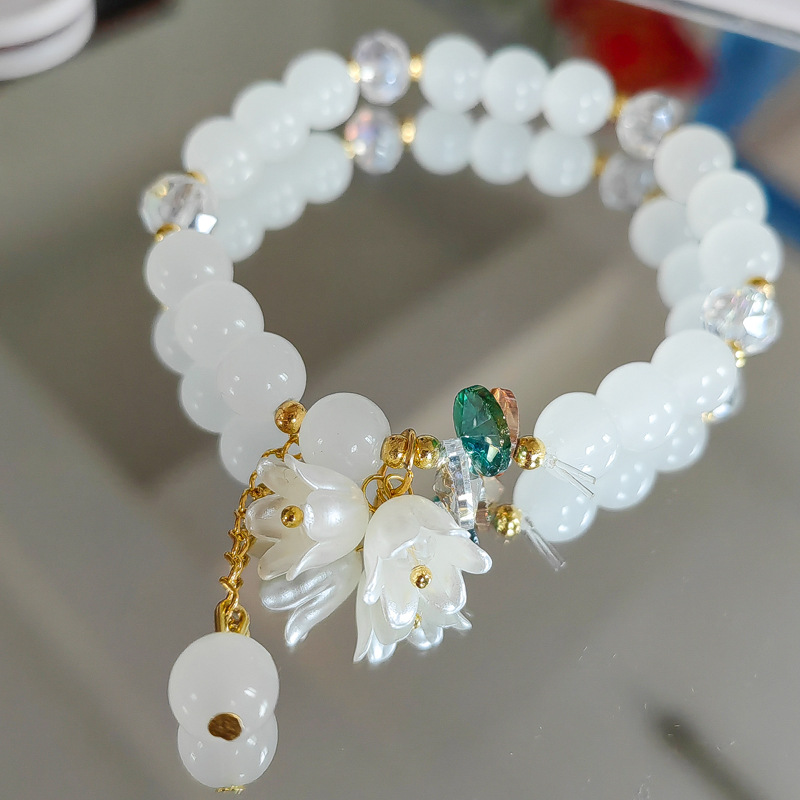 Bonita pulsera de cuentas de cristal verde para mujer, pulsera elástica ajustable con dije de flor de Lily Valley, joyería de cumpleaños y boda: Oro oscuro