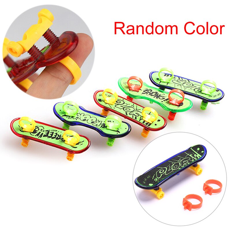 1 pc söta festleksaker barn barn mini fingerbräda greppbräda legerad skateboard leksaker färg slumpmässig