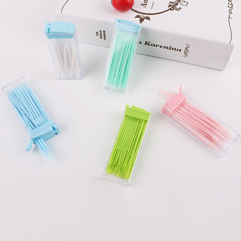 Palillos de dientes de plástico de dos cabezas, palitos de hilo dental desechables de Color aleatorio, herramientas de limpieza respetuosas con el medio ambiente, accesorios de viaje, 50 Uds.