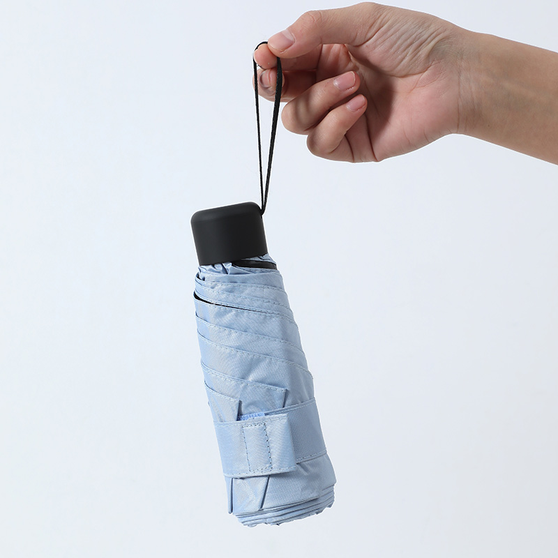 Mini paraguas plegable ultraligero de bolsillo para mujer, paraguas plegable pequeño a prueba de viento para viaje, paraguas compacto para lluvia para hombre, paraguas protector solar para exteriores