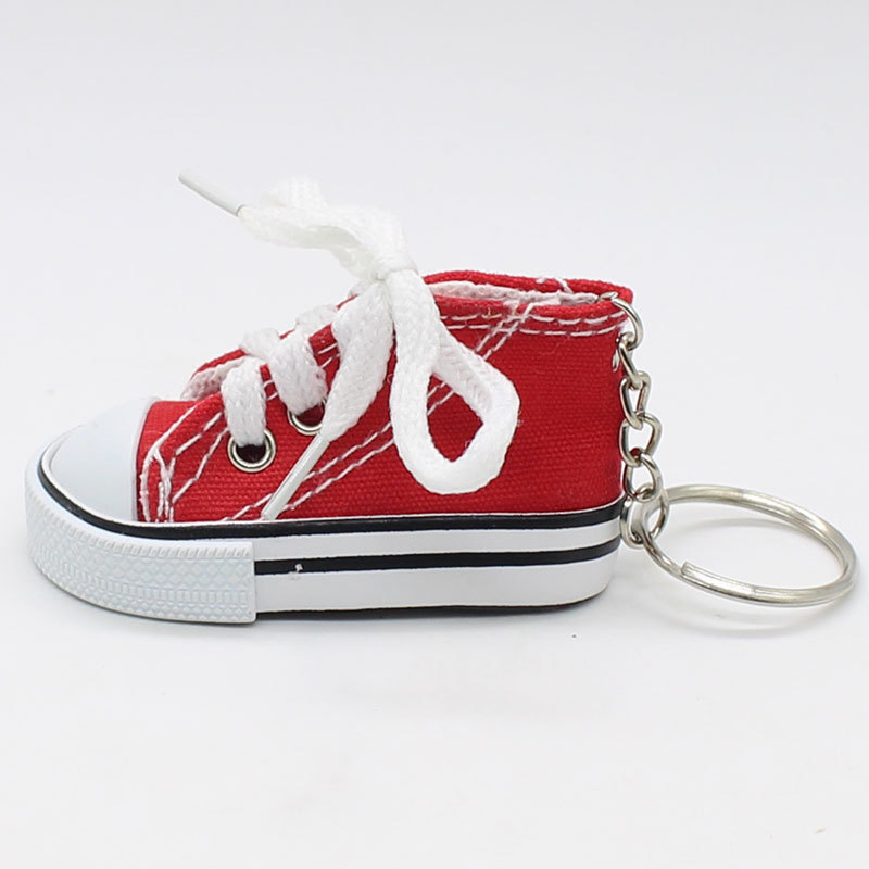 Cavalletto laterale per moto Divertente e carino Mini scarpa Supporto per piede per bicicletta Cavalletto per bici da motore Portachiavi Accessori per giocattoli Supporto per moto: Rosso