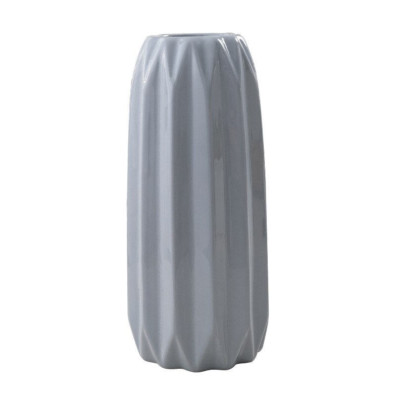Moderne enkel origami keramikkvase farget pulver grå blå gul hvit store, mellomstore og små blomsteroppsatser