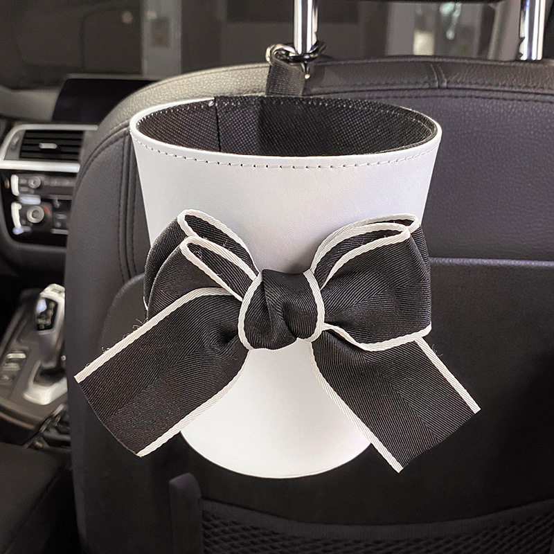 Sac poubelle à nœud papillon pour voiture, mignon, pour siège arrière, appui-tête, Mini sortie automatique, organiseur de ventilation, sac poubelle, boîte de rangement, seau: white black bow