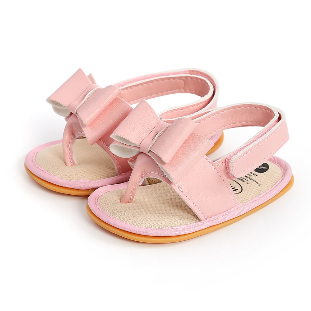 Sandalias planas con lazo para niñas pequeñas, chanclas con correa en T, de Color sólido, simples: Rosa / 0-6 meses