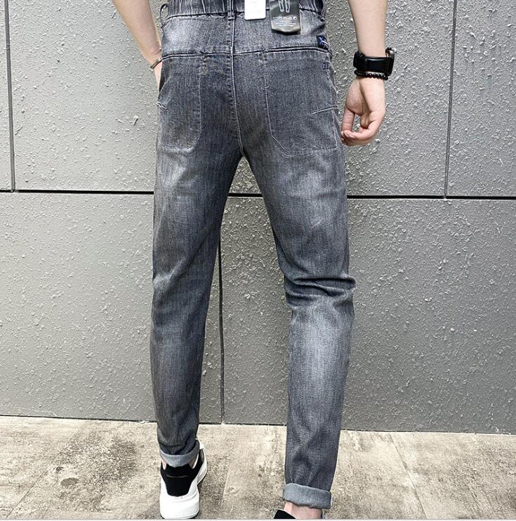 Høst klassisk menn uformelt mellomhøyde rette jeans lange bukser komfortable bukser løs passform herreklær herrejeans