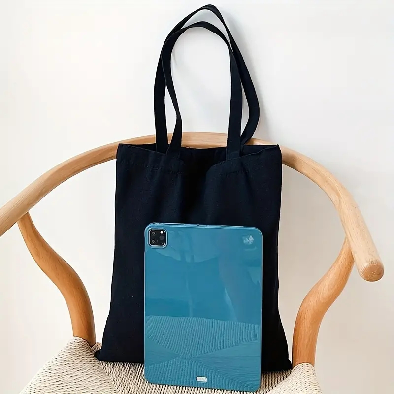 Einfache und lässige einfarbige Segeltuch-Material-Handheld-Umhängetasche für Damen mit großer Kapazität zum Einkaufen und Reisen