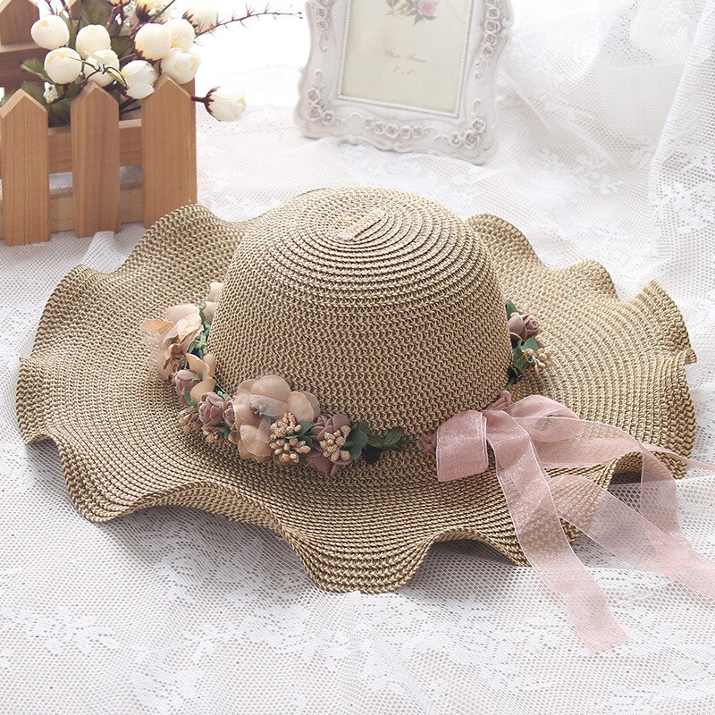 Ht1689 korea stil kvindelige hatte til sommer solid anti-uv bred skygge floppy hatte damer blomst krans strand hatte bølge brim sol hat