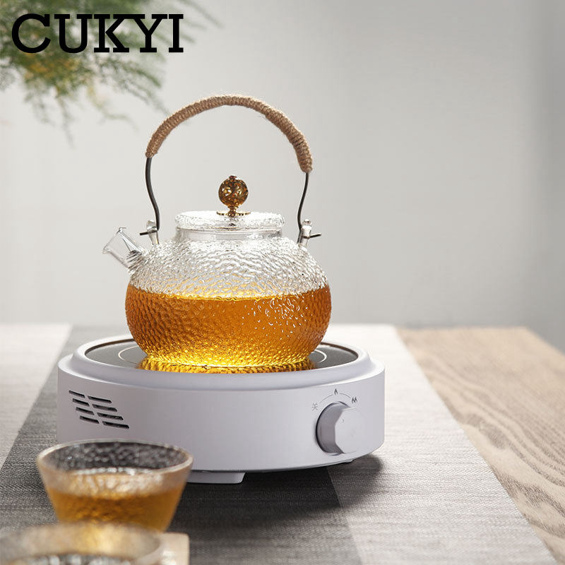 CUKYI-estufa eléctrica de cerámica de 110V/220V, 2 engranajes de potencia de fuego, perilla ajustable, Caldera de té portátil, estufa Universal impermeable, utensilios de cocina