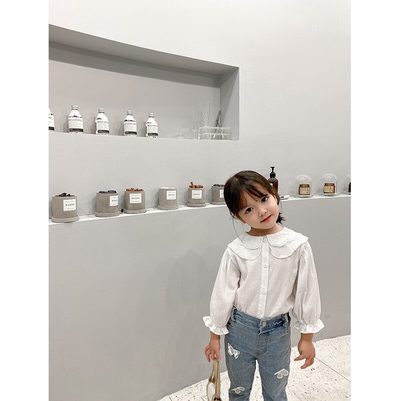 Camisa blanca pura de para chicas otoño contrajo la nueva camisa suelta de manga de encaje camiseta para niños