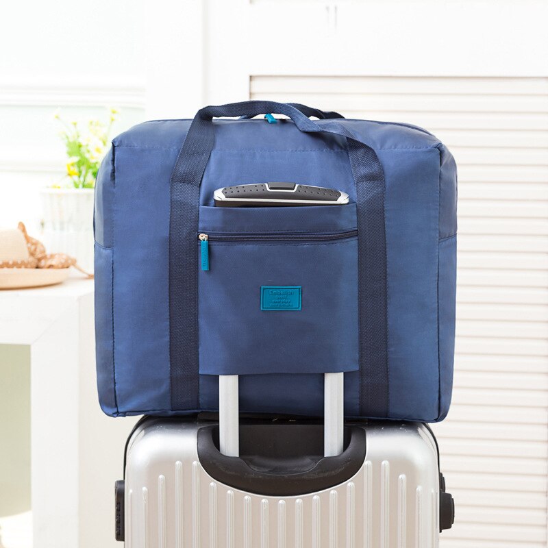 Airplane bag aircraft bag waterproof portable luggage bag large capacity clothing travel storage bag Korean folding luggage bag: Navy