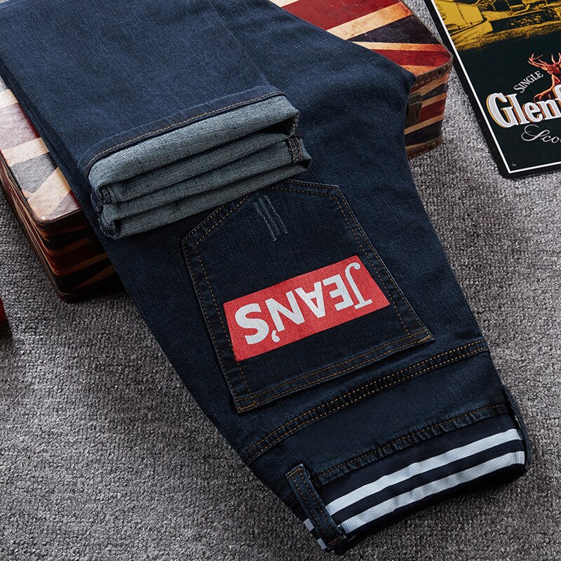 Pluss størrelse 44 46 48 klassiske, løse, rette jeans til menn virksomhet uformelle denim stretchbukser til menn svart blå bukser