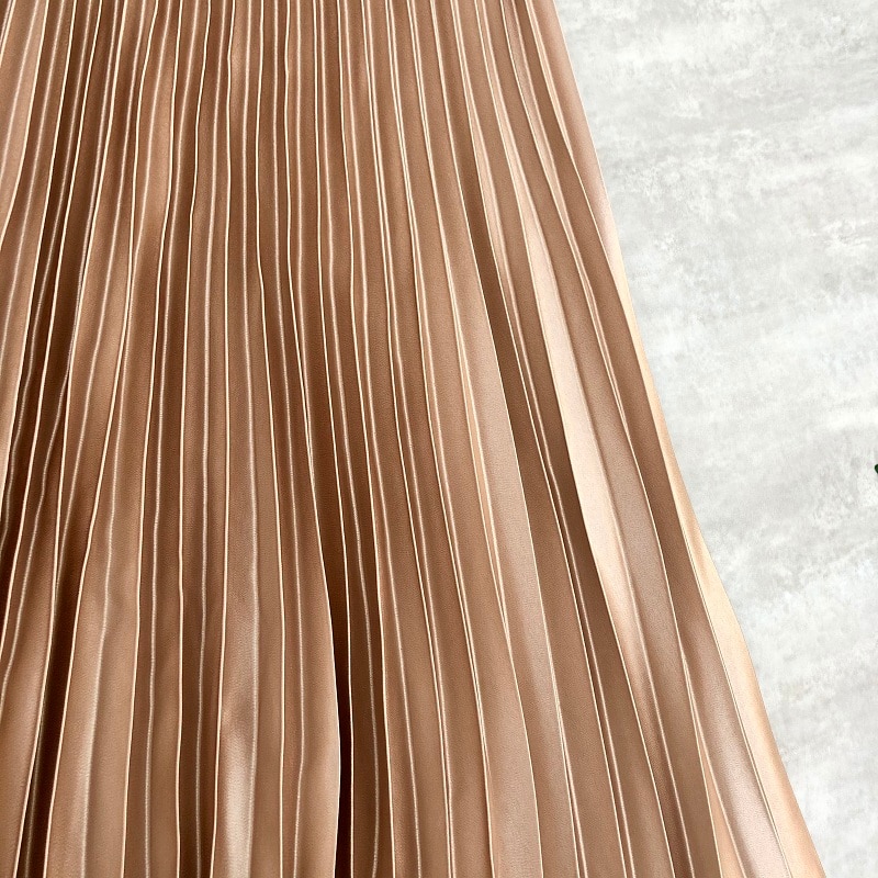 Forår kvinder midi nederdele metallic farve skinnende plisseret nederdel ensfarvet sølv guld lang nederdel satin femme jupe kontor dame