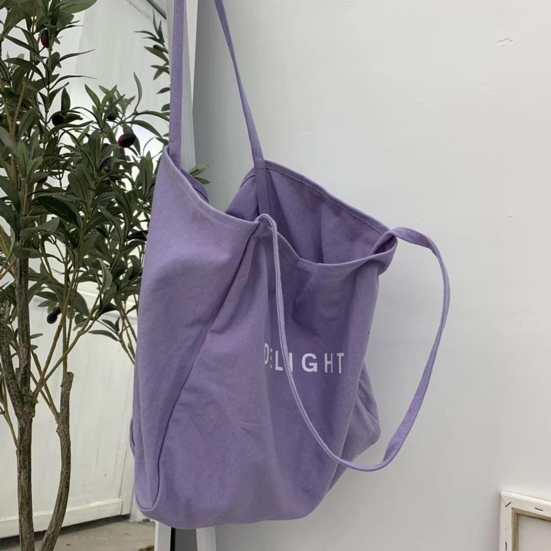 Einfache damen-schultertasche aus canvas, großes fassungsvermögen, umweltfreundliche einkaufstasche in bonbonfarben, lässige tragetasche für damen.: Lila