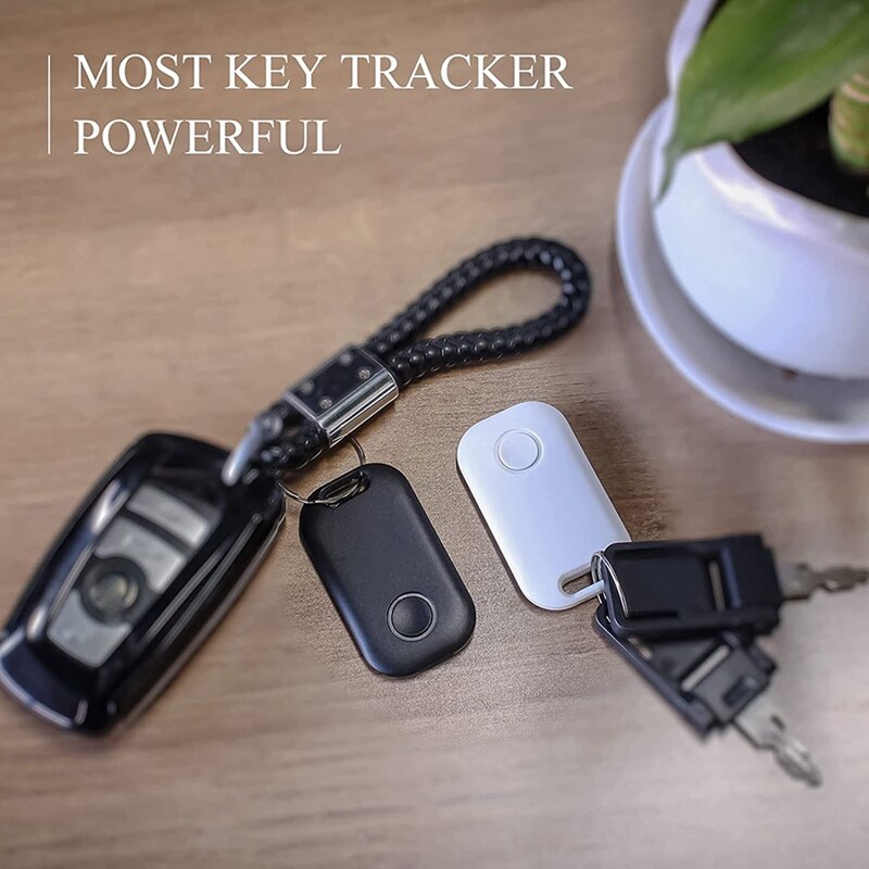 4 stück schlüsselortungsgeräte in schwarz und weiß, bluetooth-tracker für schlüssel, haustiere, geldbörsen und schultaschen, intelligente schlüsselfinder