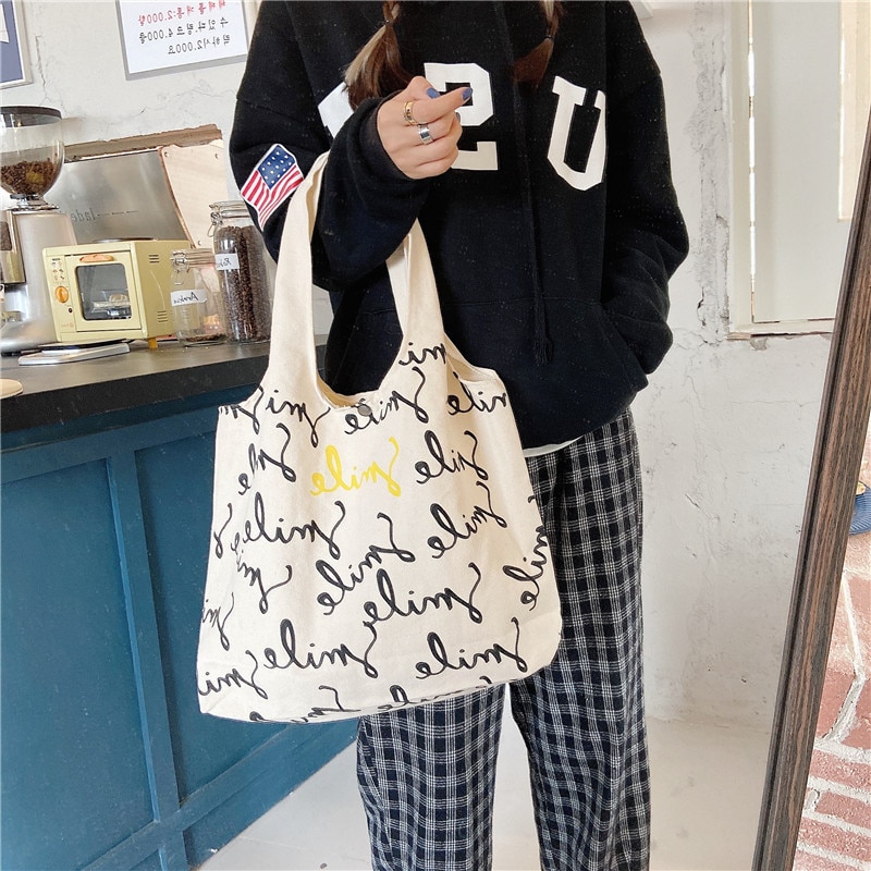 Einkaufstasche aus canvas mit smiley-schriftzug, große schultertasche aus baumwollstoff für damen, strandtasche