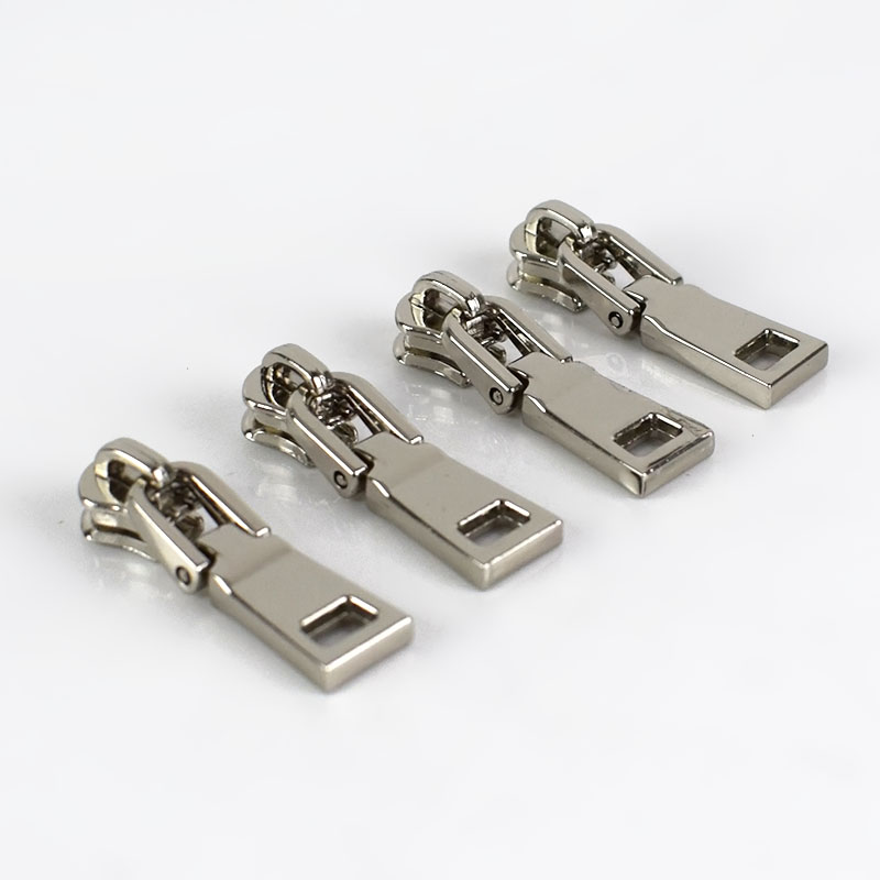 10 kpl jousilukkoa 3#  vetoketjun liukusäädintä metallisille vetoketjullisille takeille vaatteiden vetoketjun korjaussarja vetoketjun vetimet tee-se-itse-laukkujen ompelutarvikkeet: Hopea -no3