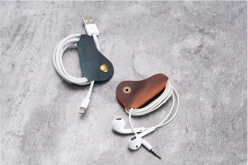 Organizador de cables para auriculares, soporte enrollador de cuero de vaca, 2 unidades