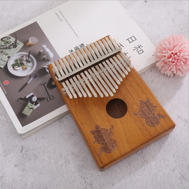 17- taster kalimba thumb piano kinesisk stjernetegn mønster bærbart thumb piano gir god lyd og studiebok for nybegynnere: Drage