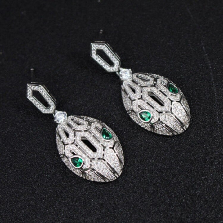 incrusté hao pierre creuse boucles d'oreilles femme ovale vert oeil serpent animal boucles d'oreilles simple personnalité boucles d'oreilles bijoux: Plaqué Argent