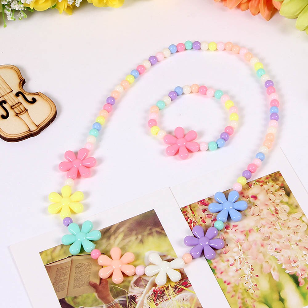 Nouvelle belle fille enfants soleil fleur collier Bracelet Earclip Imitation perles fleur enfants ensembles accessoires