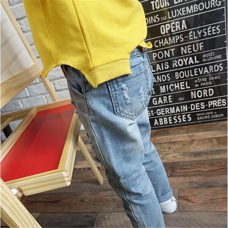 Moda bambini Jeans strappati Jeans pantaloni Jeans per ragazze pantaloni in Denim per ragazzi Jeans per bambini pantaloni in Denim rotto per bambini vestiti per bambini