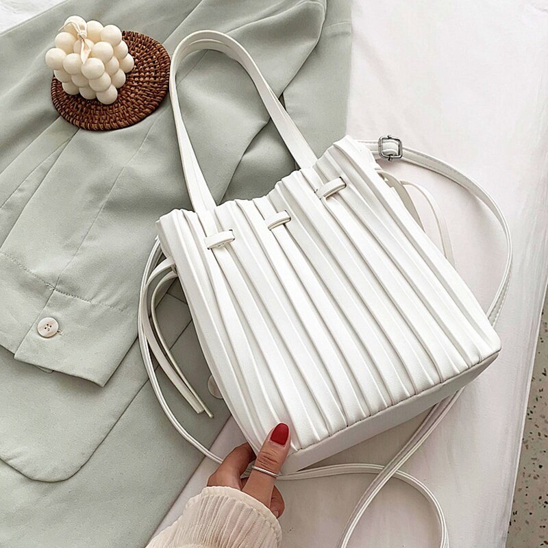 Trekkoord open emmer crossbody tassen voor vrouwen effen kleur geplooide schouder handtassen reis crossbody tas portemonnee