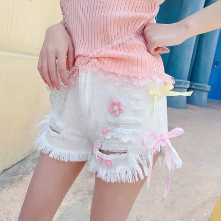 Sommar kawaii junior jeansshorts kvinnor korea hollow out korta shorts ins rosa vit rosett jeans feminino casual hål underdel: Vit / M