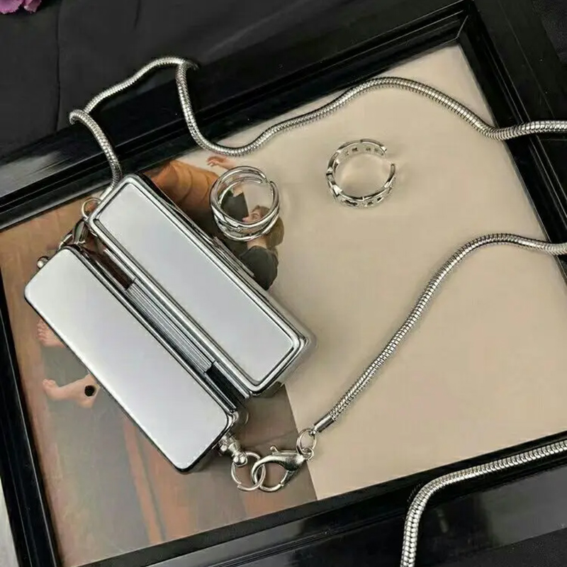 MINI bolso de lápiz labial de estilo metálico, cadenas de acero inoxidable, monedero con broche de , estilo euroamericano