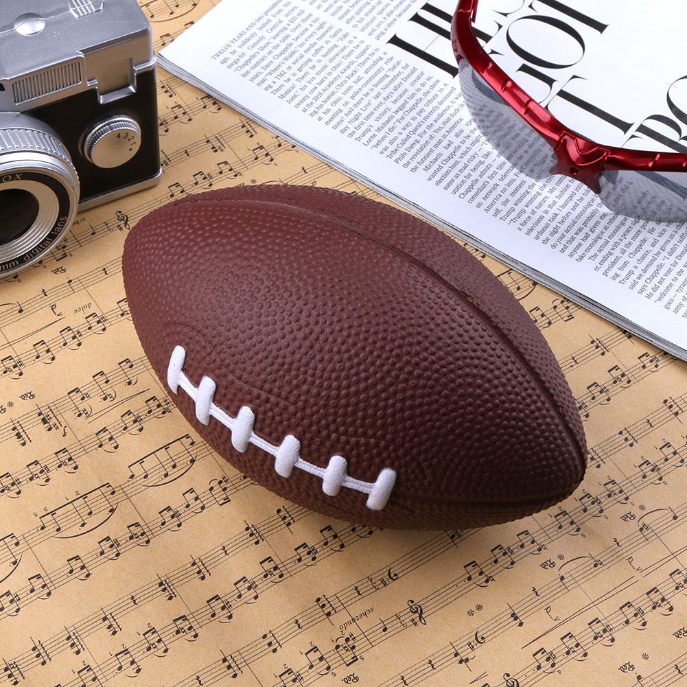 Mini balle de compression gonflable matériau mousse souple PU marron Anti-stress Rugby football 180*110*110mm balle de compression