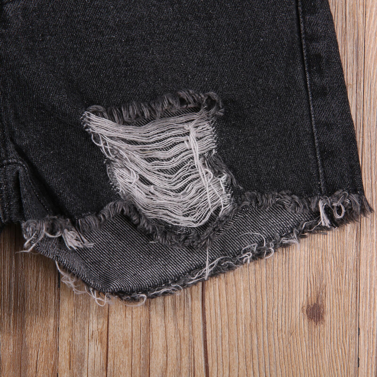 Jeans Casual per ragazze più recenti di arrivo con fori rotti pantaloncini di stoffa di Jeans tinta unita per bambini blu scuro/nero