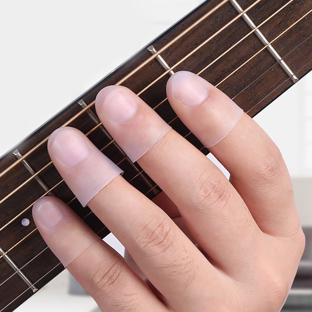 Protector de dedos de silicona para guitarra, funda ultrafina para mano izquierda, 4 unidades