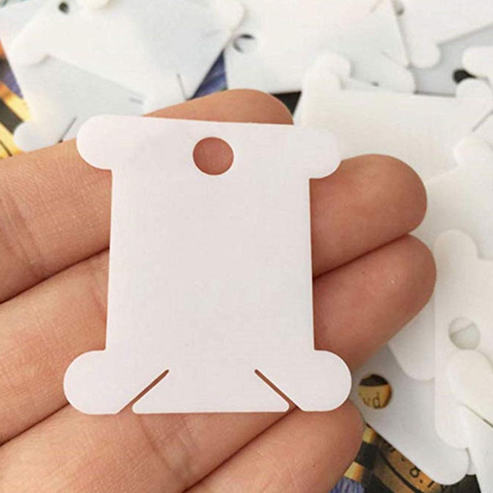 Bobinadora de cuerdas y bobina de Hilo de plástico para bordar tarjetas, soporte de almacenamiento, herramienta para bobinar puntadas, 1 ud.