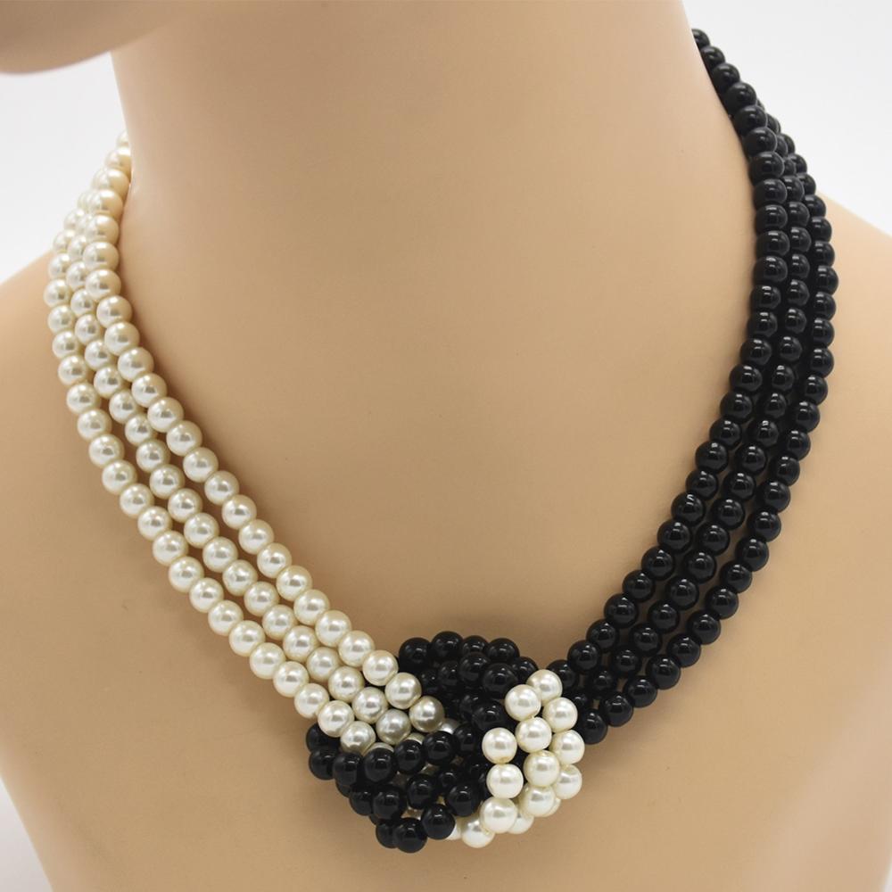 Kvinders perle korte halskæde uafhængig original sort og hvid tofarvet perlehalskæde kvindelige tøj vilde smykker