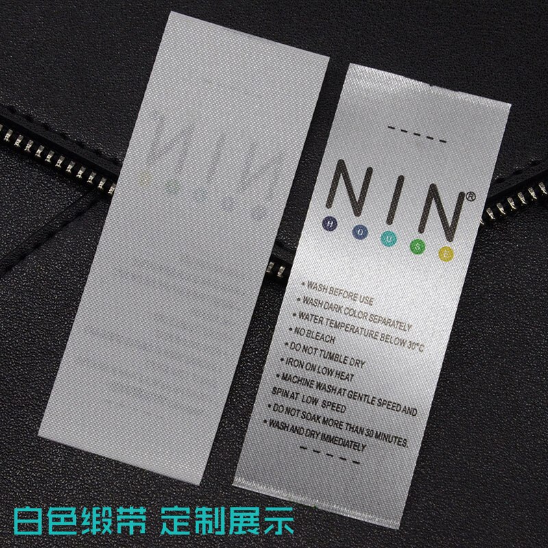 Etikettenrohling aus stoff mit aufgedruckten waschetiketten, bedrucktem band und gewaschenem weizen für thermotransferdrucker