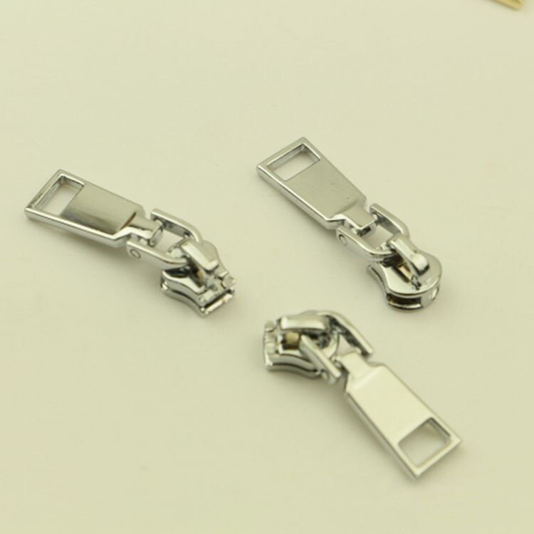 10 kpl jousilukkoa 3#  vetoketjun liukusäädintä metallisille vetoketjullisille takeille vaatteiden vetoketjun korjaussarja vetoketjun vetimet tee-se-itse-laukkujen ompelutarvikkeet: Kromi -no3