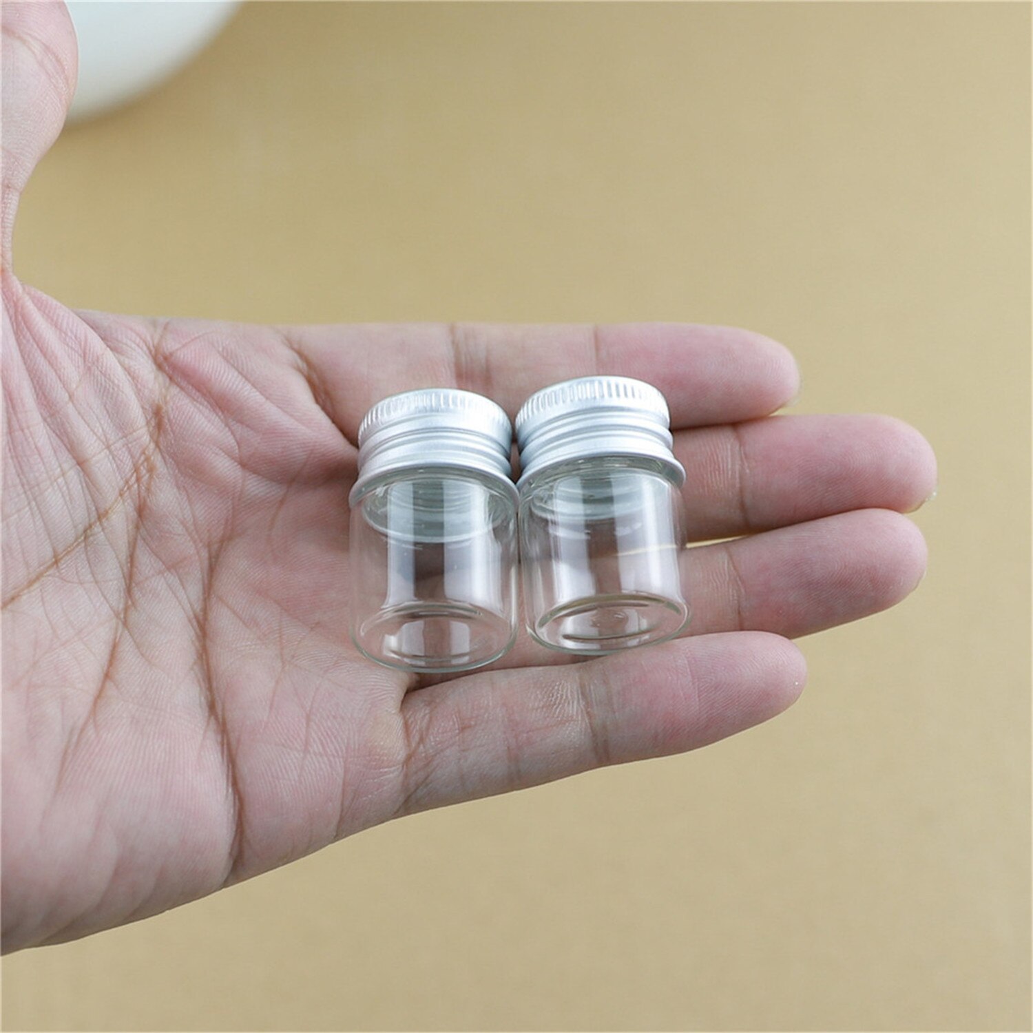 50 st/lot 22*30mm 5ml små glasburkar flaskor silver skruvkork förvaringsburk minibehållare genomskinliga glasflaskor flaskor
