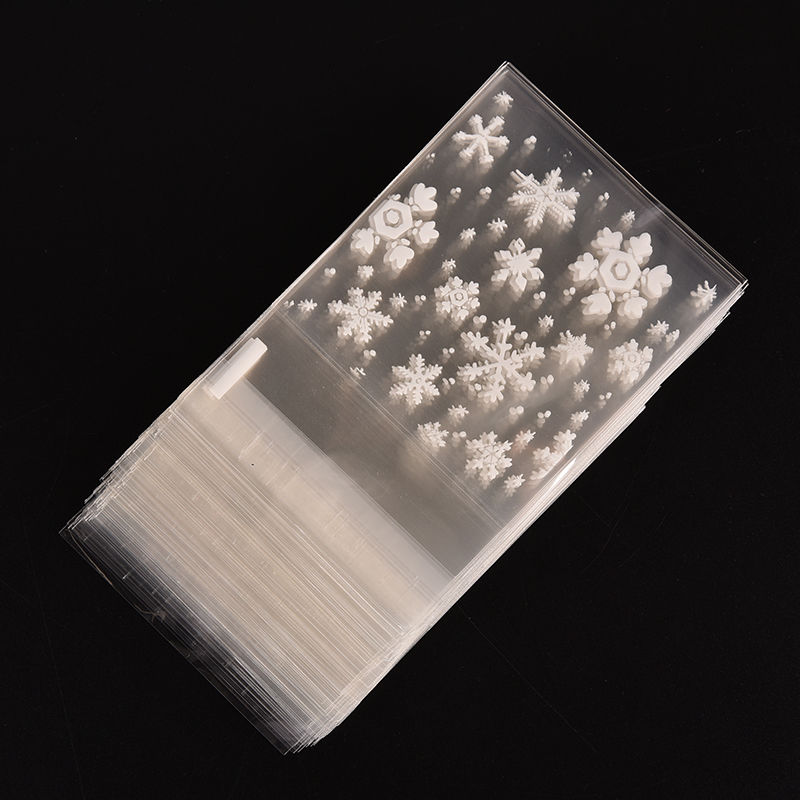 100 st godispåse självhäftande påsar julsnöflinga tryck skrivbordsorganisator klämma hållare påsar