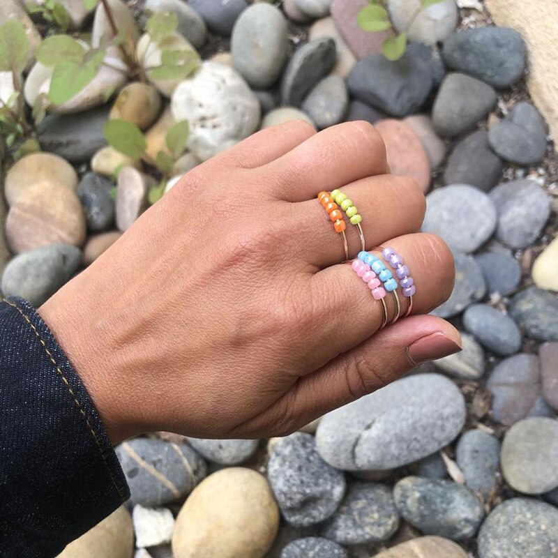 Anillo giratorio con cuentas de colores para niña y mujer, juguete de anillo antiestrés y ansiedad, espiral, giratoria
