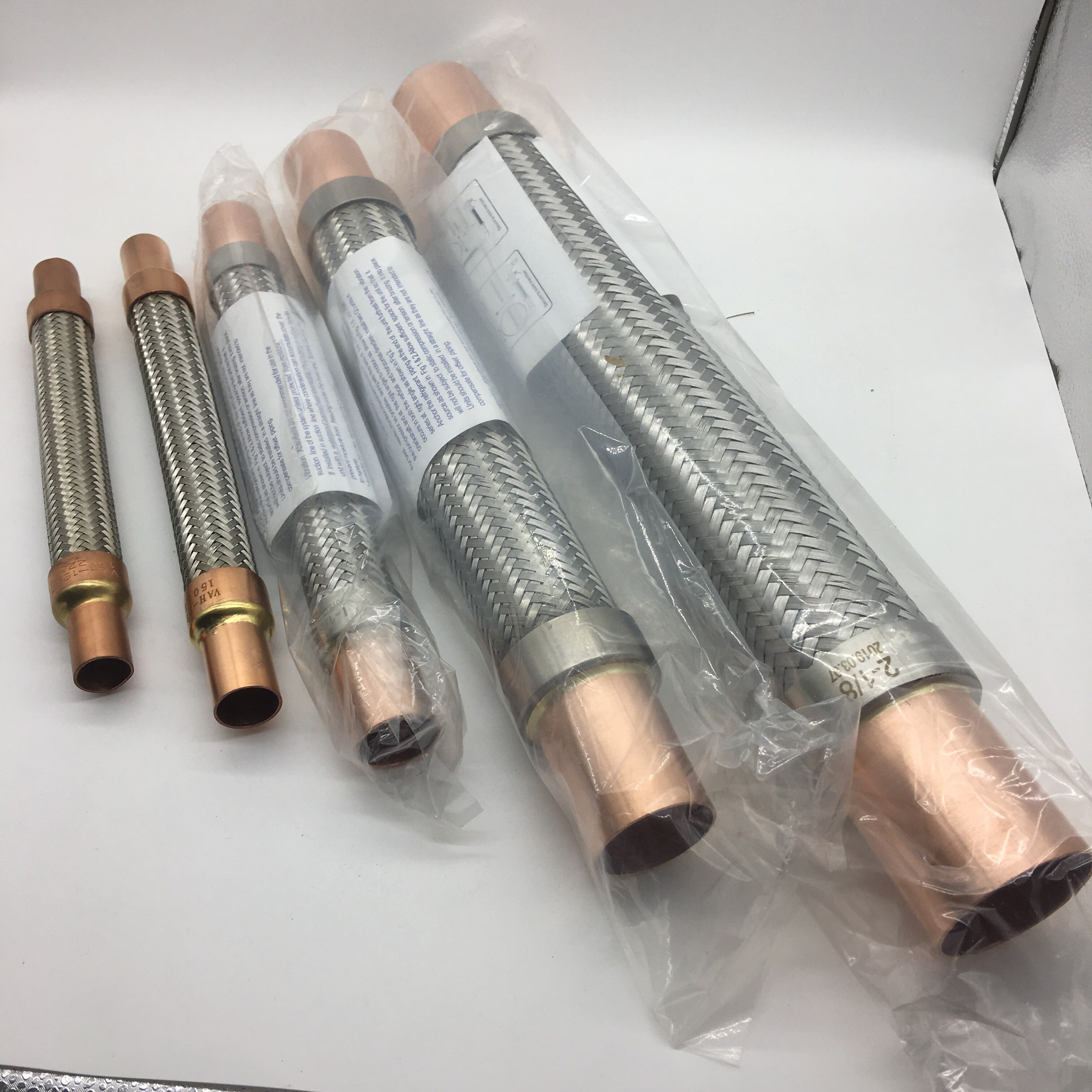 7/8" vibration absorber is both on suction and discharge lines of a refrigerating system, as close as possible to the compressor