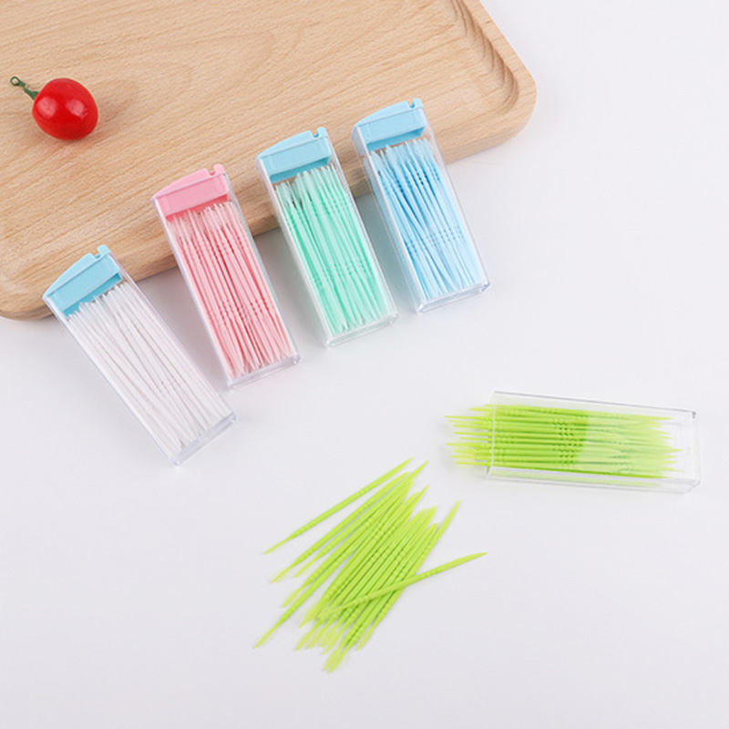 Palillos de dientes de plástico de dos cabezas, palitos de hilo dental desechables de Color aleatorio, herramientas de limpieza respetuosas con el medio ambiente, accesorios de viaje, 50 Uds.
