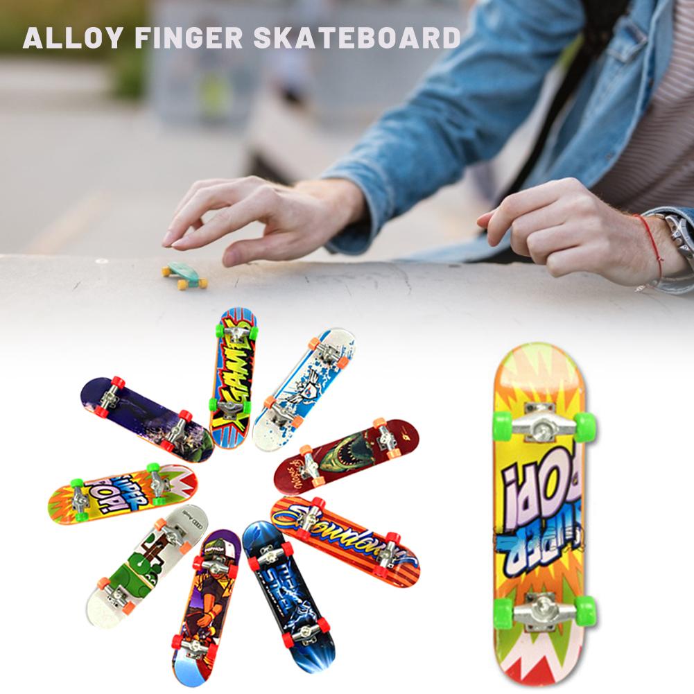Søt fest favor barn barn mini fingerbrett gripebrett legert skate boarding leker tilfeldig
