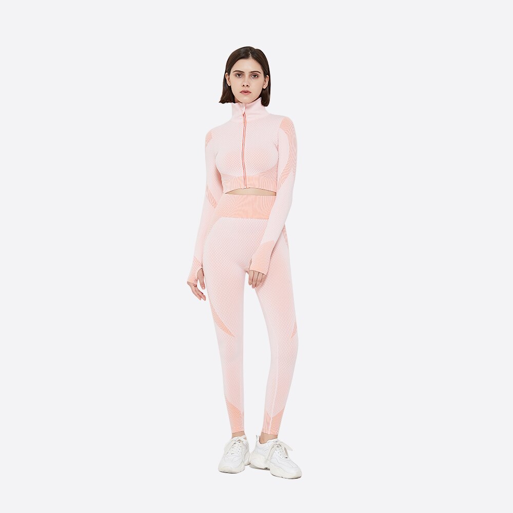 Avskuren långärmad träningstopp och leggings med hög midja i rosa