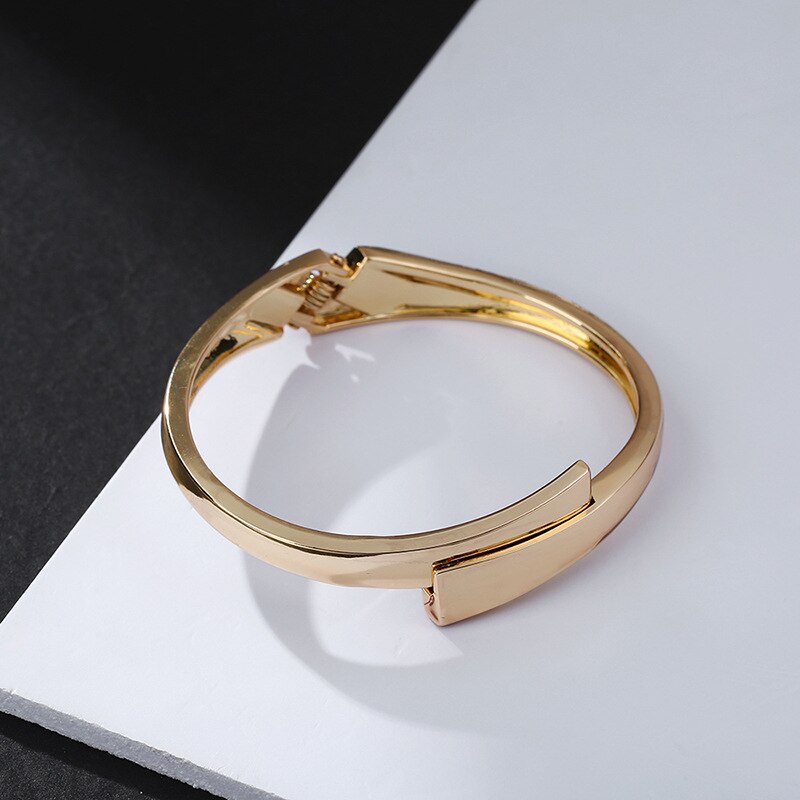 Pulsera de aleación con línea cruzada para mujer, brazalete sencillo de oro, a la , con personalidad