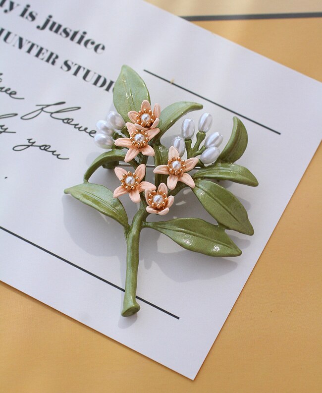 HUANZHI Vintage émail vert couleur plante perles broche arbre Lotus feuille myrtille fleur bambou broche pour femmes bijoux: 11