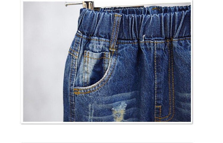 Forår børnetøj slanke solide huller denim blå baby piger drenge jeans til piger drenge børn afslappede jeans lange bukser