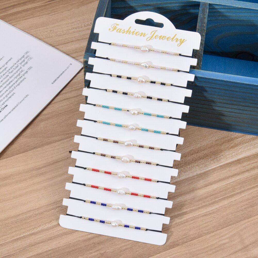 Romantico 12 pz/lotto Perla Pendenti E Ciondoli Braccialetto impostato per Le Coppie Della Ragazza Delle Donne Della Maglia Regolabile Nodo Stringa di semi di Perline Braccialetto Dei Monili del Regalo