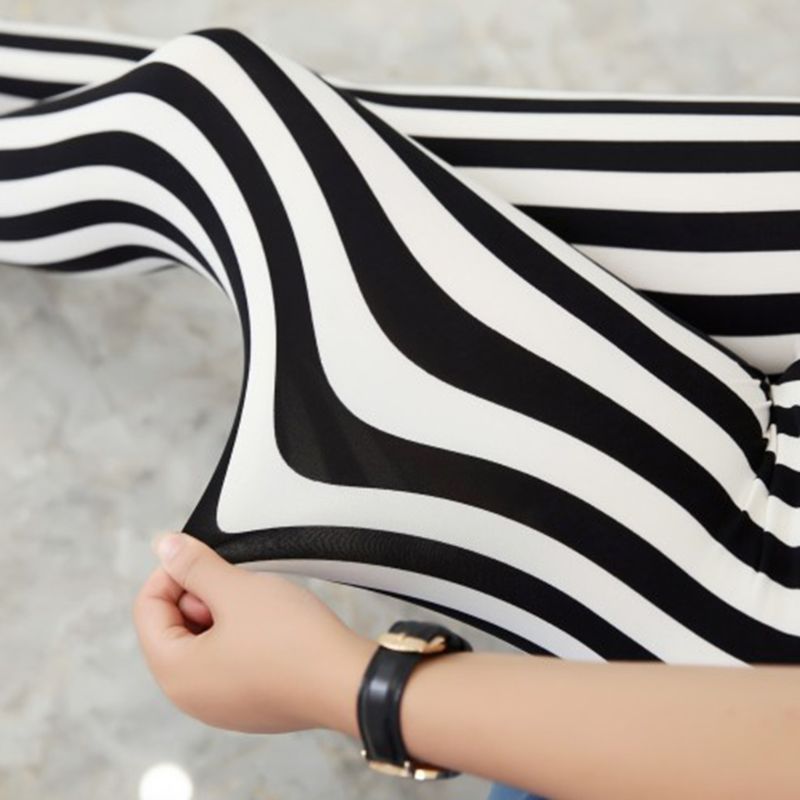 Mallas elásticas hasta el tobillo, de corte medio, para mujer, estampado de rayas verticales en negro y blanco, pantalones Capri informales elásticos
