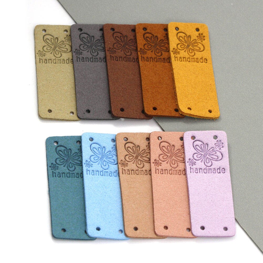 Etichetta fatta a mano farfalla 20 pezzi etichette in pelle per abbigliamento etichette fatte a mano per cucito cappello fai da te accessori per cucire 2x5CM 10 colori